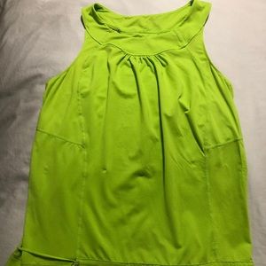 Racerback yoga T-shirt, drawstring at hip line.